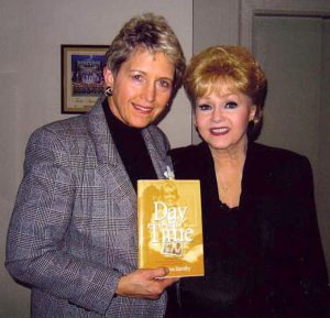 Debbie Reynolds performed at the Circle Theatre downtown and posed with me and the book.
